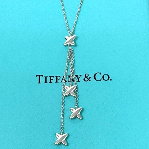 Authentic Tiffany & co. Triple X Kiss Cross Drope Necklace.